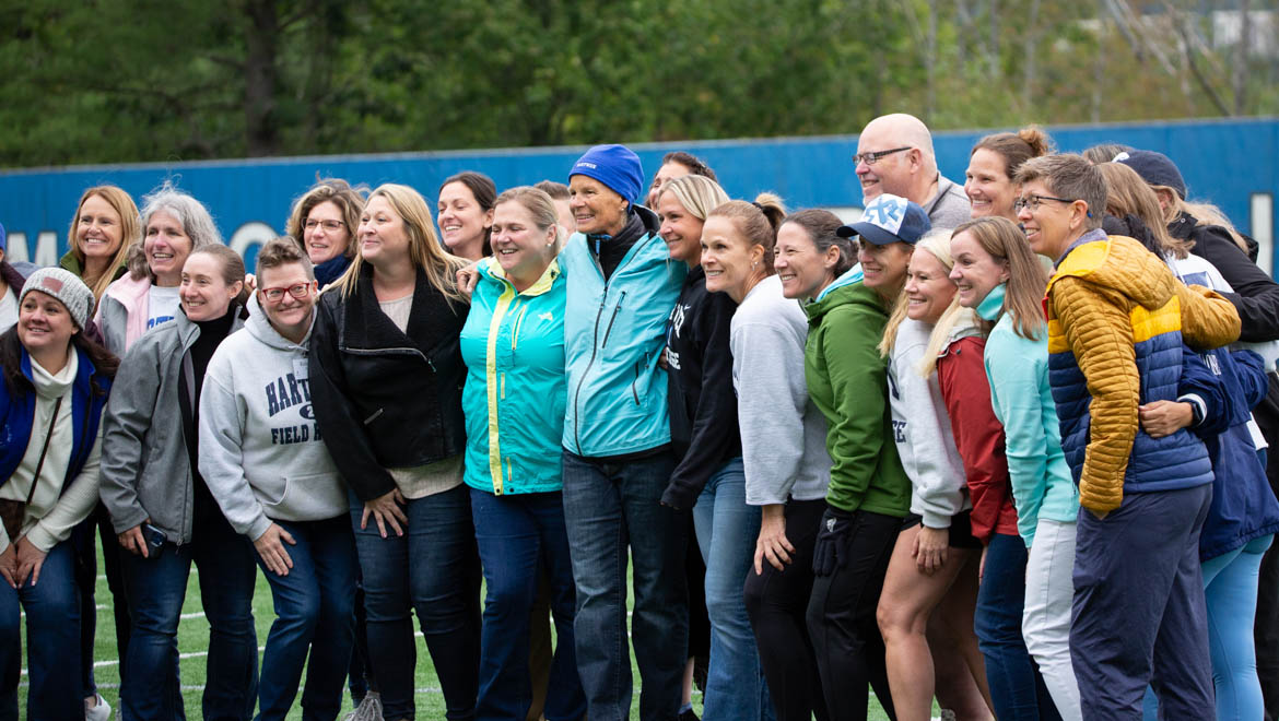 Hartwick College field hockey and women's lacrosse alumni with Coach Anna Meyer during True Blue Weekend