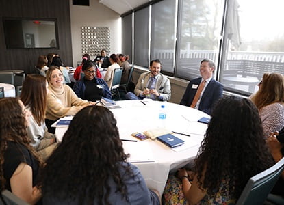 Hartwick College students with alumni mentors during Hawk Career HOP