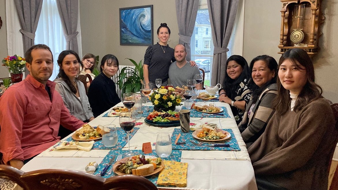 Ana Laura Gonzalez and family with Hartwick College international student guests at Thanksgiving