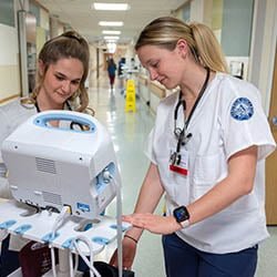 Hartwick College nursing students on hospital floor during their clinical rotation