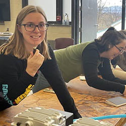 Hartwick College students making journals