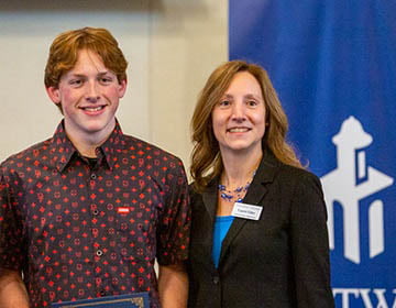 High School essay contest winner with Professor of Political Science & Co-Director Institute of Public Service