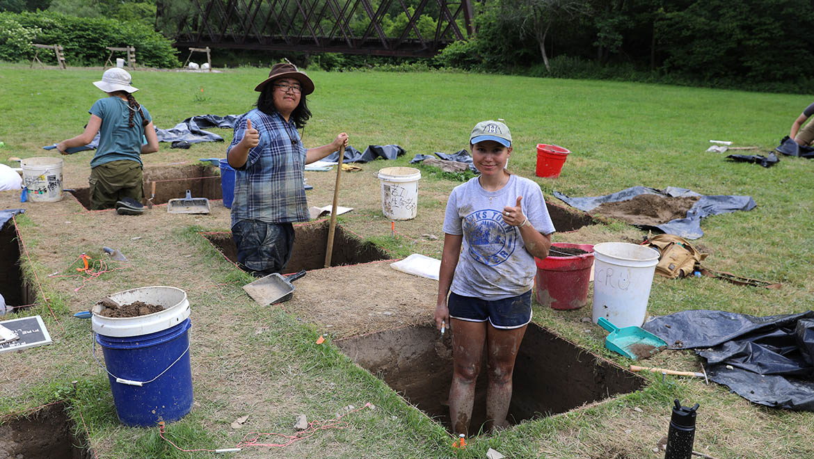 Field Archaeology students at excavation site at Hartwick College's Pine Lake Environmental Campus dig