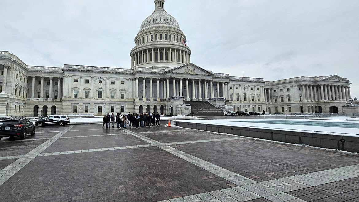 Hartwick College students in front of US Capitol during field trip to Washington DC for J Term Courses US Policy & Community and Museums & Power