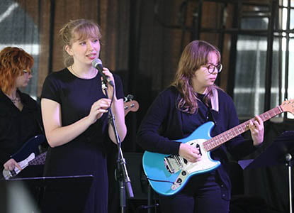 Hartwick College student members of the Rock Ensemble performing