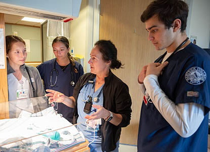 Hartwick College nursing students in hospital unit during clinical rotation