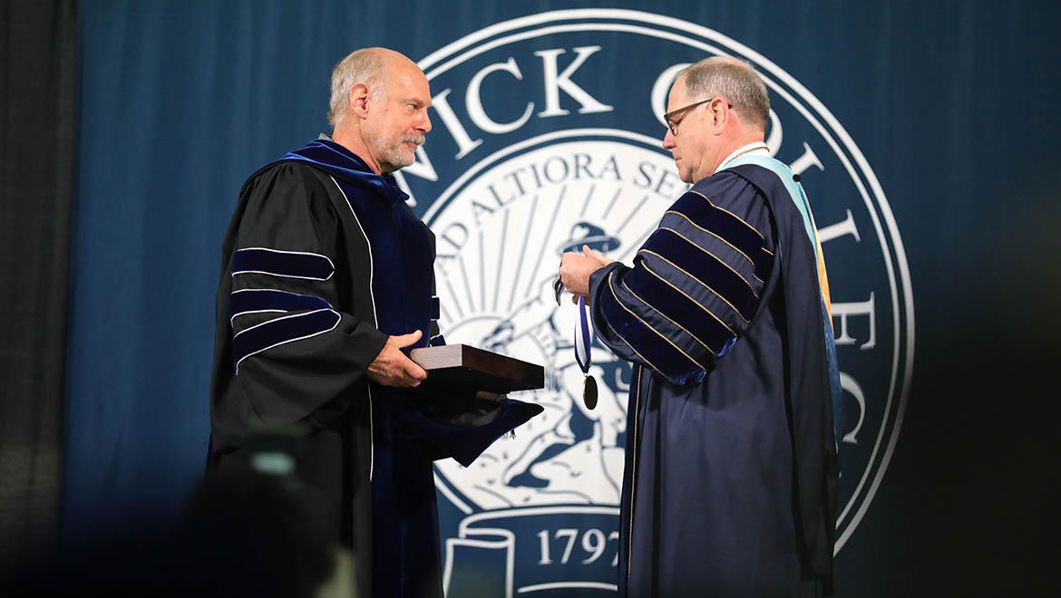 President's Medal recipient Raymond (Larry) Laurence Miller, Jr. '73 with Interim President Mullen
