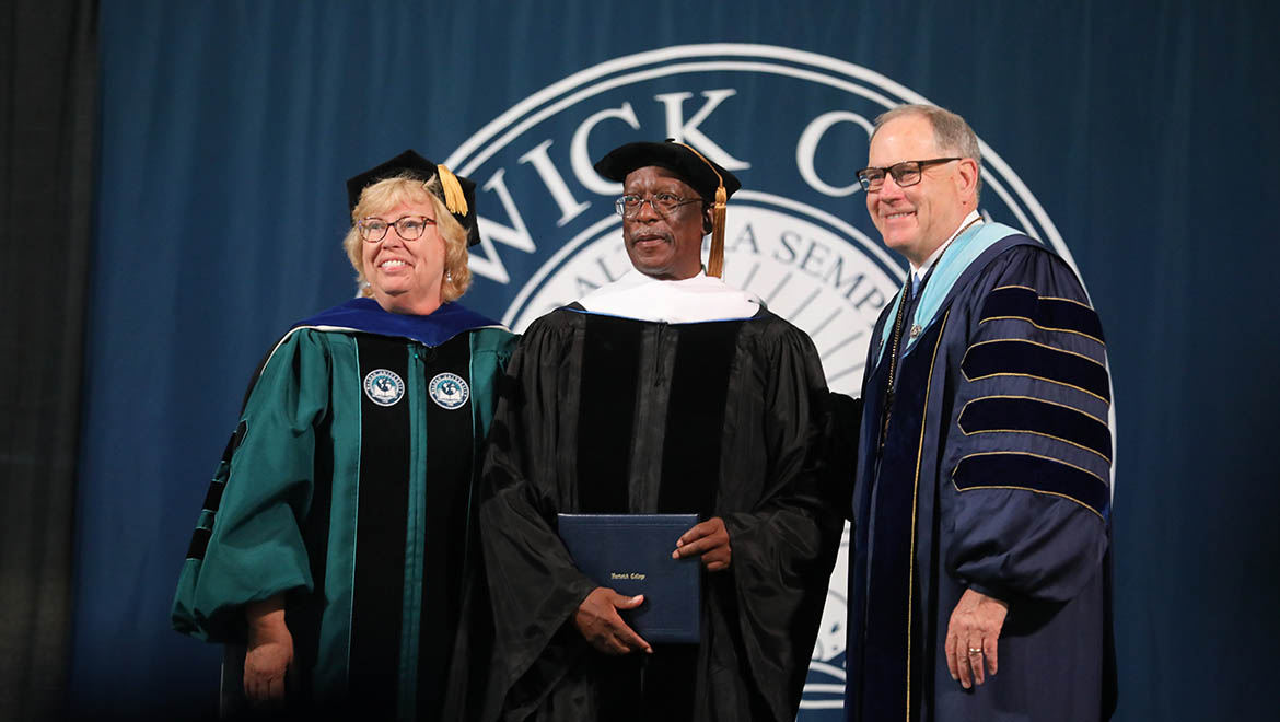 Honorary Degree recipient Harry Bradshaw Matthews with Laurel Bongiorno and Interim President James Mullen