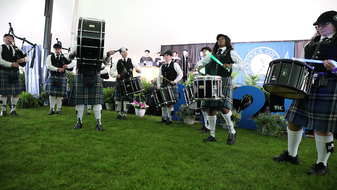 Broome County Celtic Pipes & Drums perform before Hartwick College recessional at the end of the Commencement ceremony