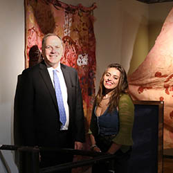 Emily Heller’s ’24 artwork “My Cave” with Interim President Mullen