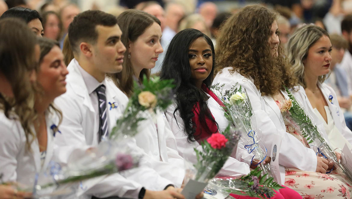 Hartwick College nursing graduates during nurses pinning ceremony
