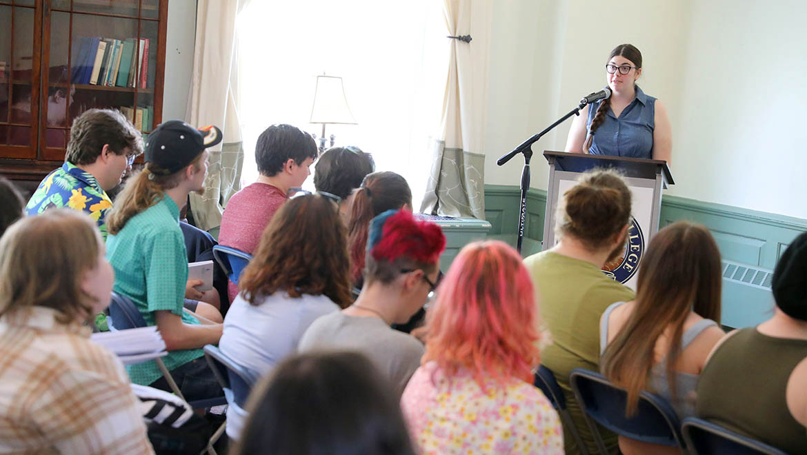 Word of Mouth student writer reading during Student Showcase