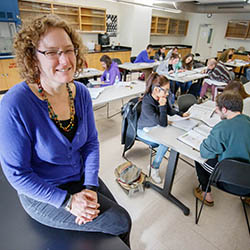 Hartwick College biology professor with students in lab class