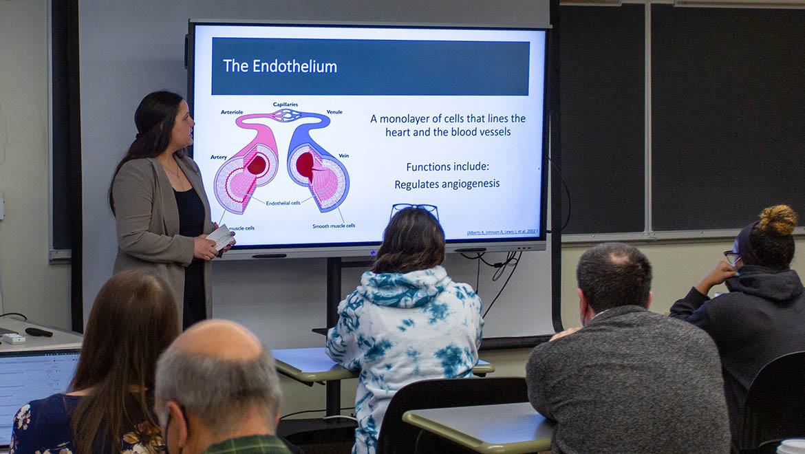 Hartwick College biology student presenting senior thesis research during Student Showcase