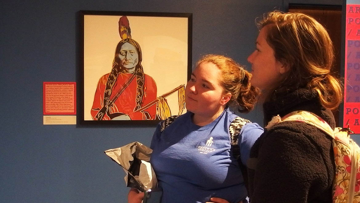 Hartwick College students viewing exhibition in Yager Museum of Art & Culture