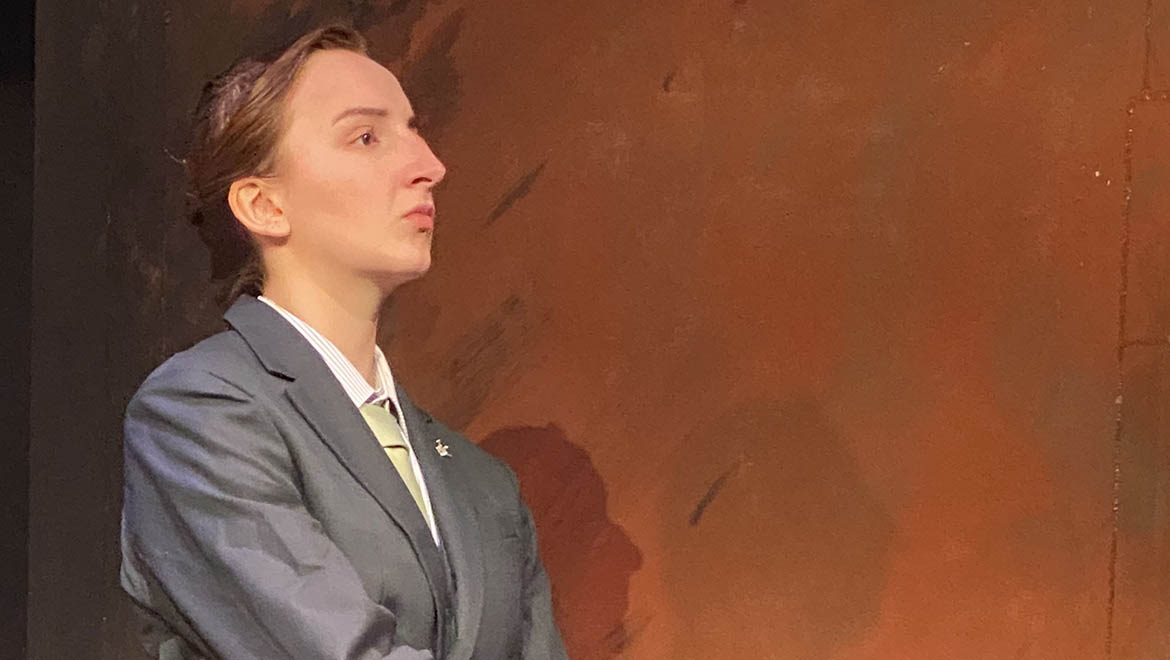 Hartwick student on stage in performance of Antigone