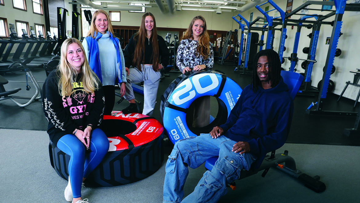 Hartwick College wellness center professional and student trainer staff in the Campbell Wellness Center