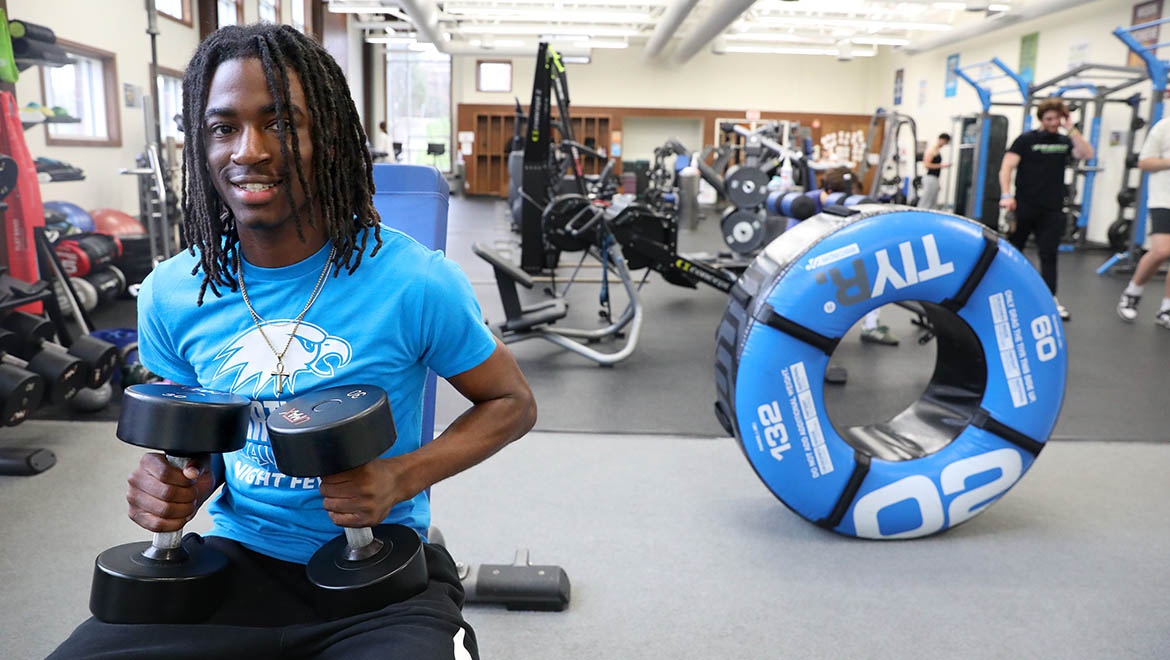 Hartwick College student trainer in Campbell Fitness Center