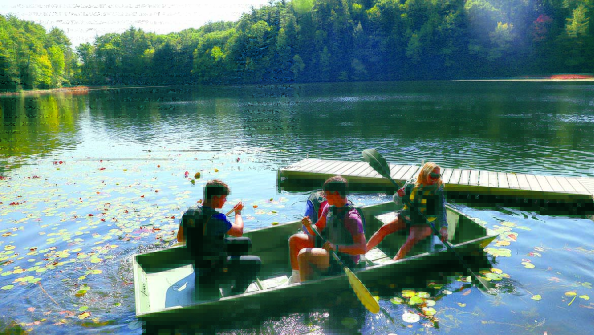 Hartwick students in boat at Pine Lake Environmental Campus