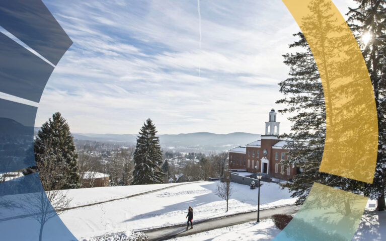 Student walks across the Hartwick College campus in winter.