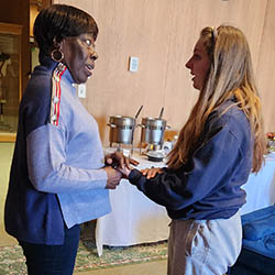 Bettie Mae Fikes talking with Gianna Boveri