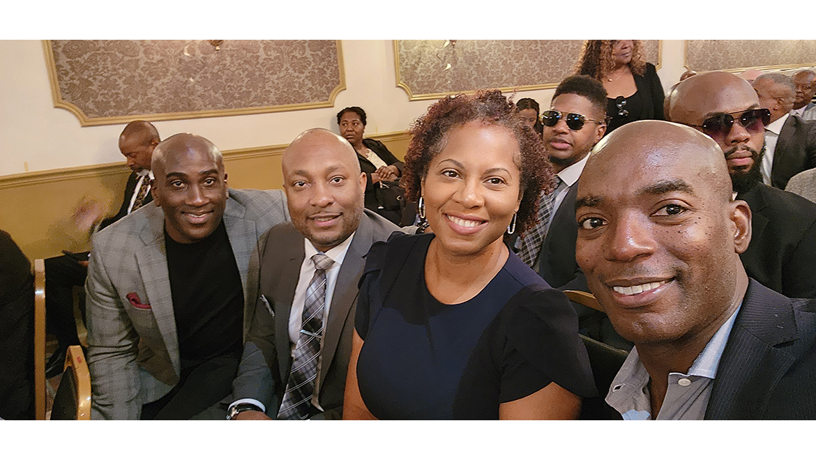 Garfield Drummond (far right) catches up with (from left) Adrian Gordon ‘98, Tavis Stanford ‘98 and LaToya Sawyer ’98
