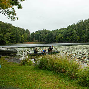 Hartwick students in boat at Pine Lake