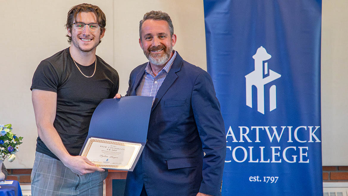 Peer Counselor Award recipient – Dylan Dwyer ’25 with Dean Cary Dresher