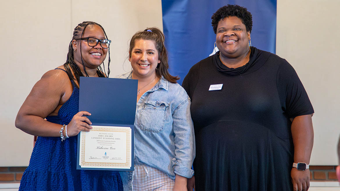 Longest Standing Diba –Katherine Coco ’25 with Alicia Richardson and Samantha Lara