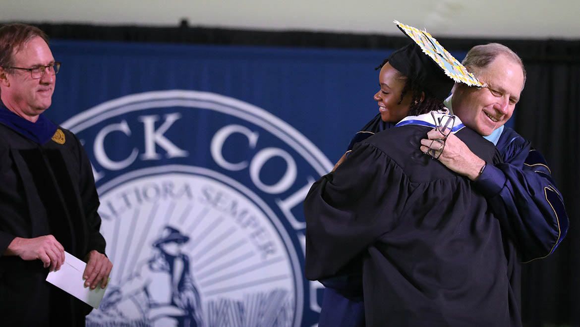 Roselyn DuMerville ’25 was awarded the Abraham L. Kellogg Oratorical Prize with President Mullen and Professor and Chair of the Faculty Buthman