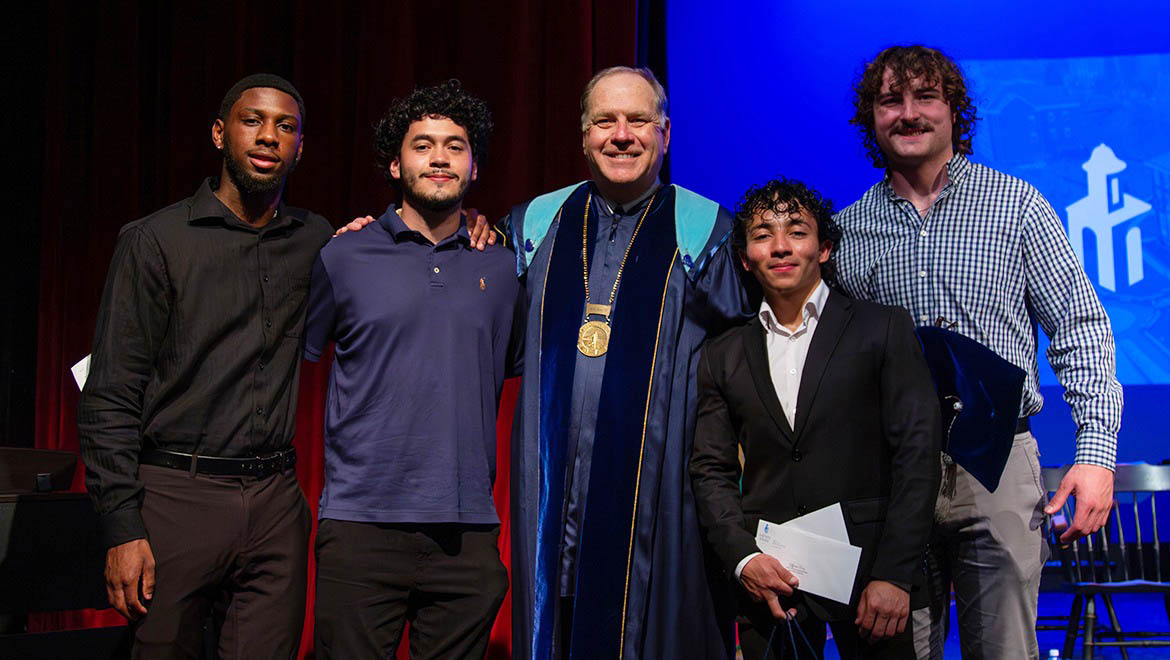 Hartwick College student scholars with President Mullen after Honors Convocation Ceremony