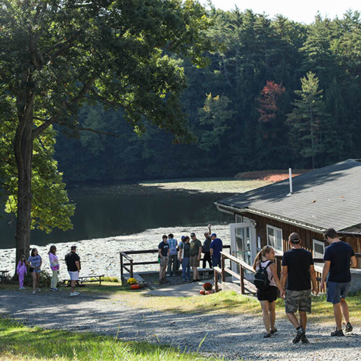 Hartwick College Pine Lake view of road to the Vaudevillian with lake in background