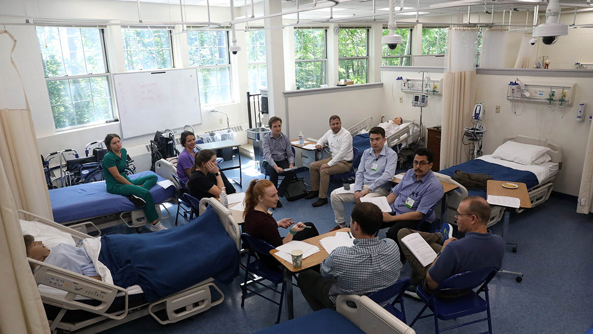 Bassett practitioners and Hartwick student participants during healthcare training summer simulation event
