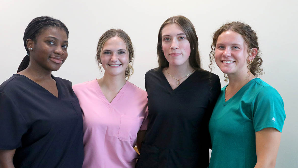 Hartwick nursing student participants during healthcare training summer simulation event: McKenna Gilbertson ’26, Haley Andrejcak ’26, Akua Manuh ’26, and Megan Rice ’26