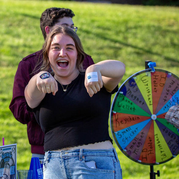 Hartwick College HCAB member at Taste of Wick Club Fair