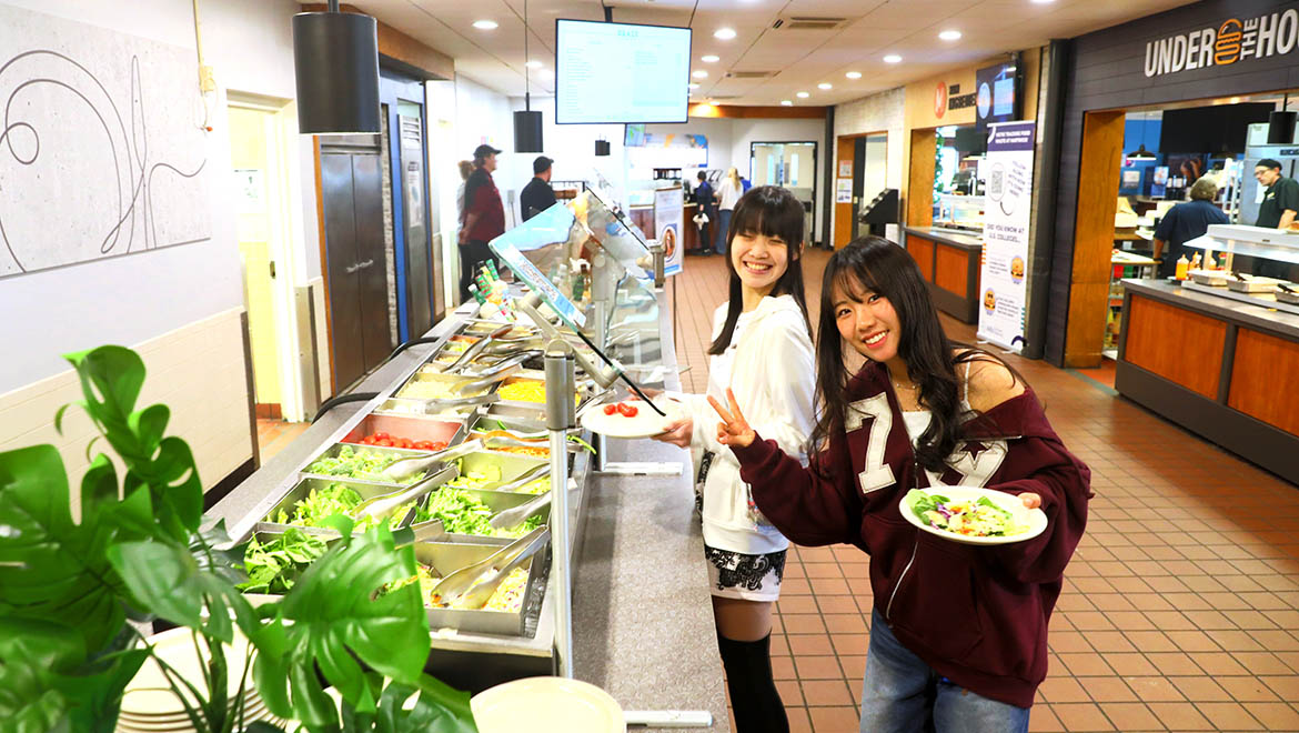 Hartwick College students at salad bar in The Commons Dining Hall