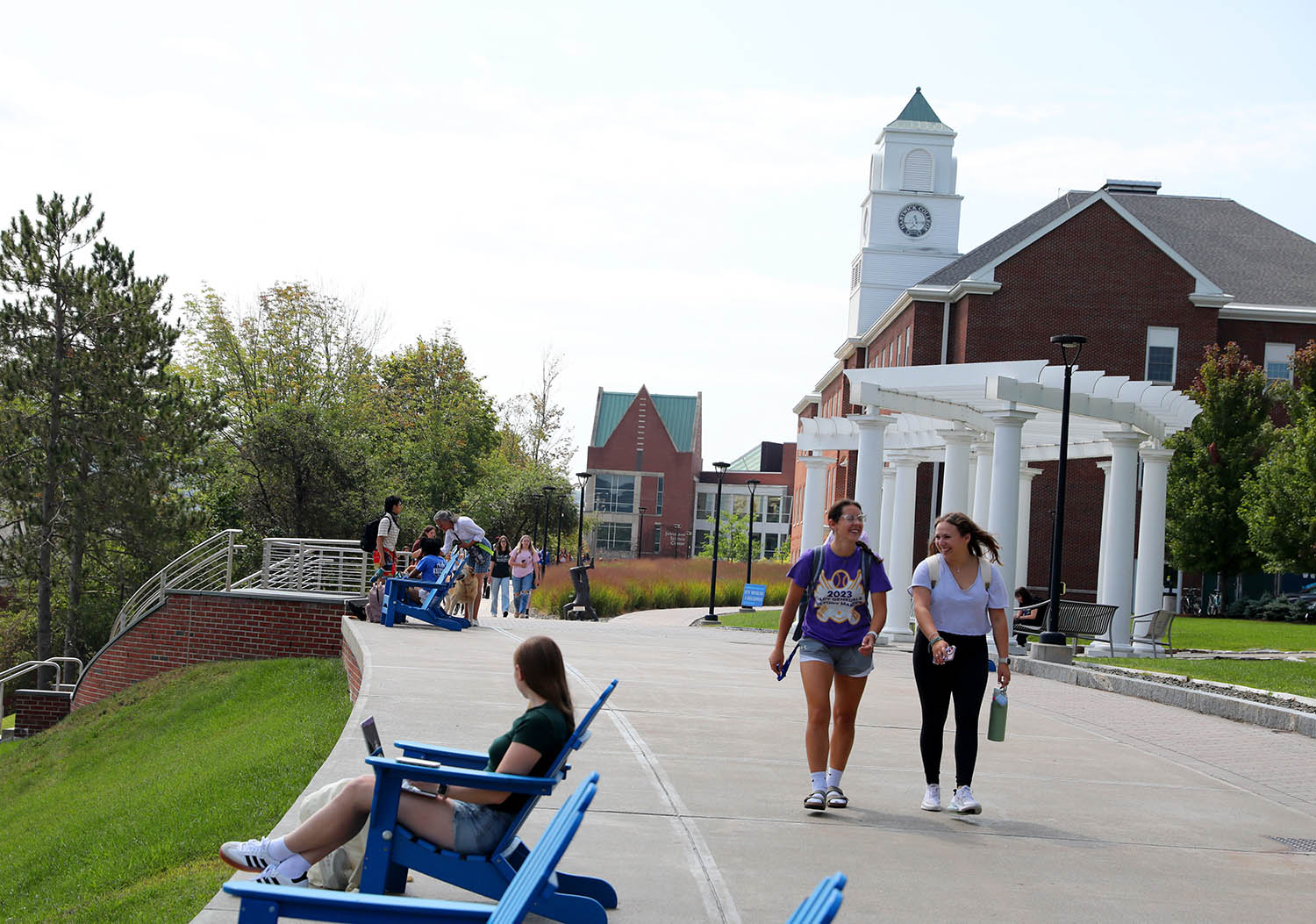 Hartwick College students walking on Founders' Way on campus