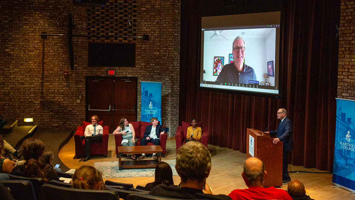 Cooper Cohen ’28, Hannah Gilliand ’27, Jack Reichel ’26, Sarah Matumbura ’26 during the virtual conversation with former Governor Jeb Bush in Anderson Theatre, Hartwick College
