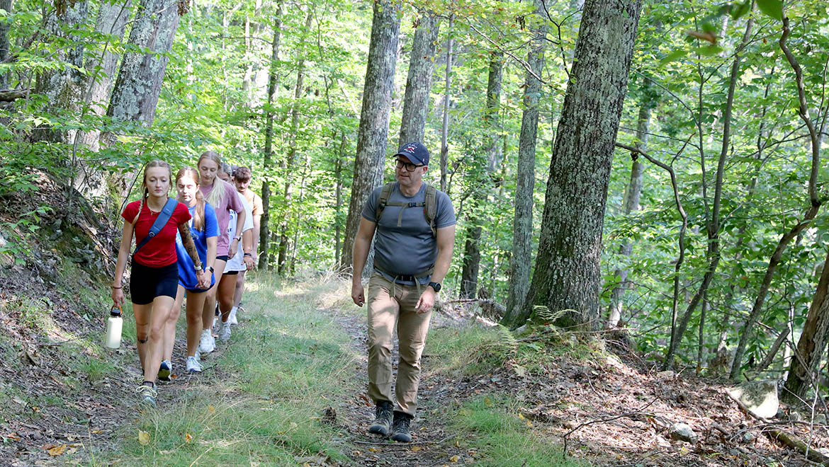 Matthew Sanford leading a hike at Pine Lake