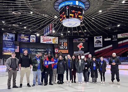 Hartwick College students and staff on center ice during Career Exploration Trip with the Utica Comets