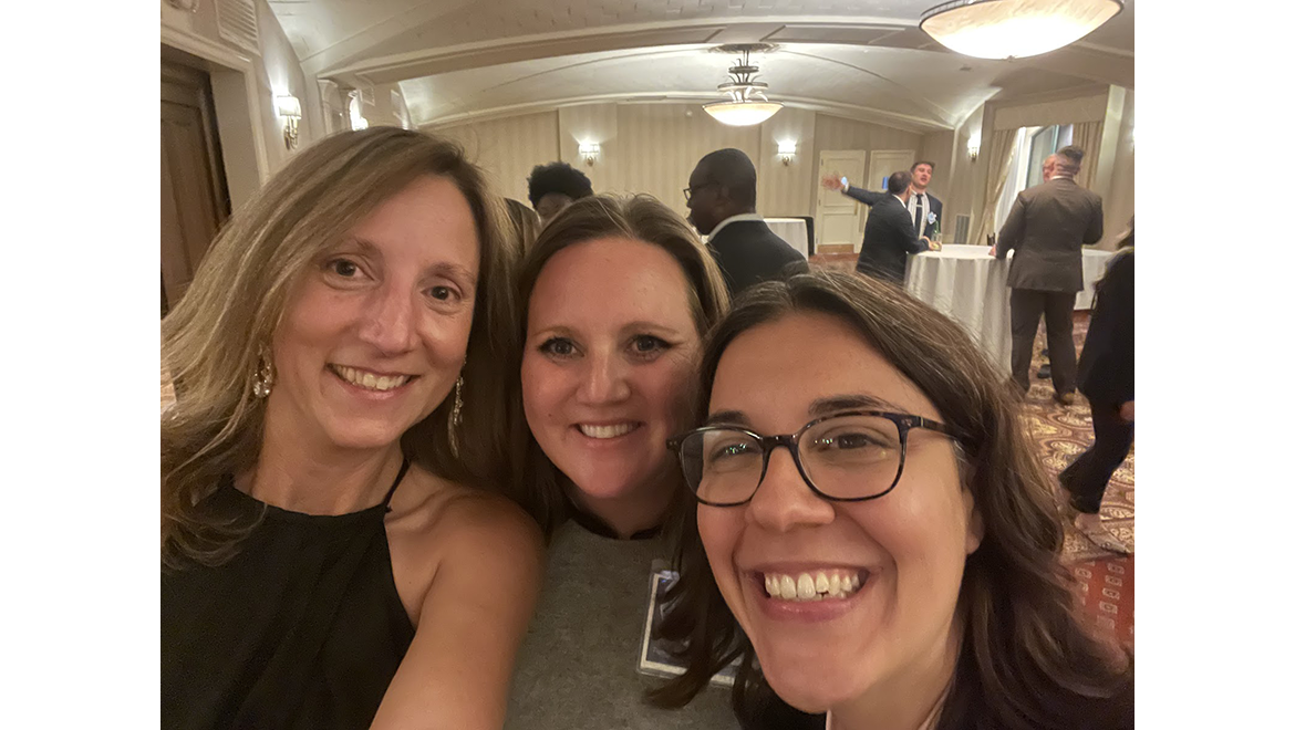 Justine Gray ’10 and Melanie Goldberg ’07 and Professor Laurel Elder during Hartwick College Institute of Public Service reception.