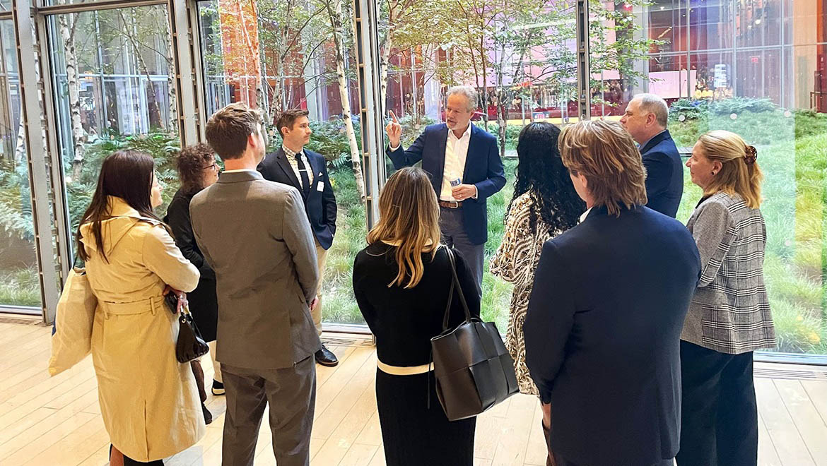 Mike McIntire ’85, P’13, P’21 leading a tour of the New York Times before the Hartwick College Institute of Public Service reception.