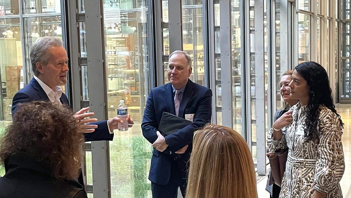 Mike McIntire ’85, P’13, P’21, Hartwick College President Mullen and Grace Nealon ’15 at the New York Times before the Institute of Public Service reception.