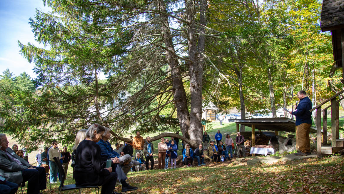 Justin Dimmel ’02 speaking about Professor Huntington at Strawbale House dedication at Pine Lake
