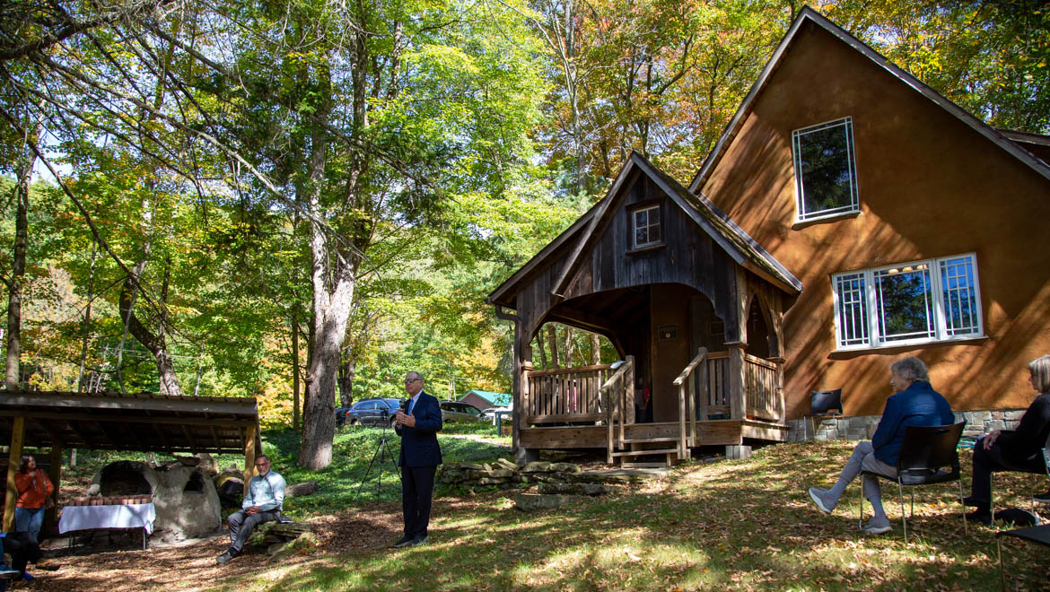 President Jim Mullen giving welcome remarks at Strawbale House dedication
