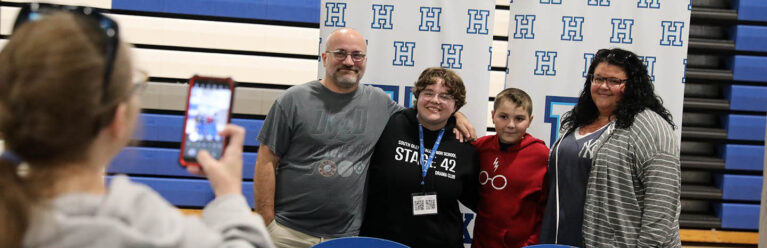 Hartwick College new student with family on move-in day