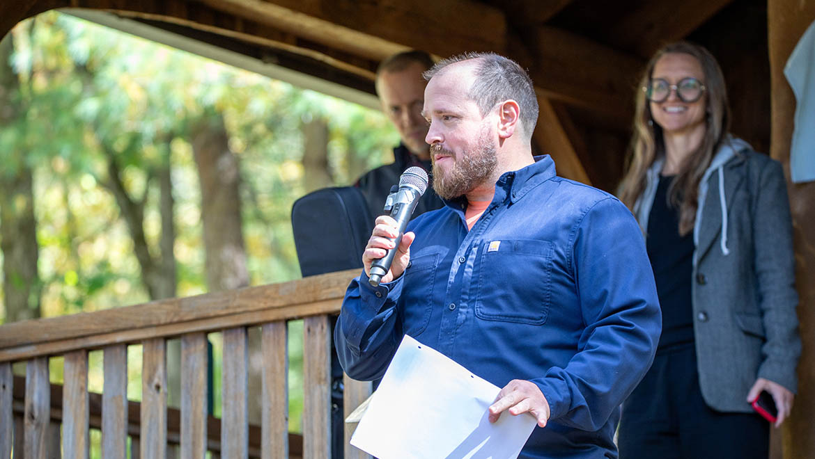 Justin Dimmel ’02 speaking about Professor Huntington at Strawbale House dedication at Pine Lake