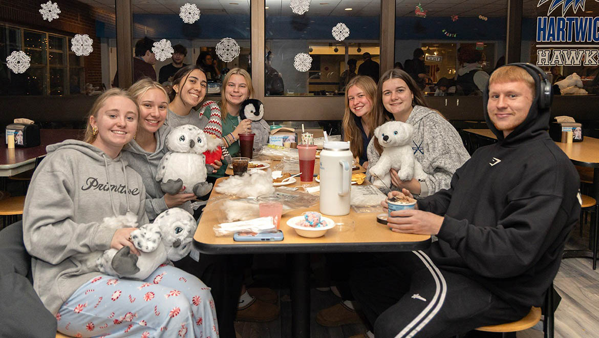 Hartwick College students at Wick Express Event in The Commons with stuffed animals