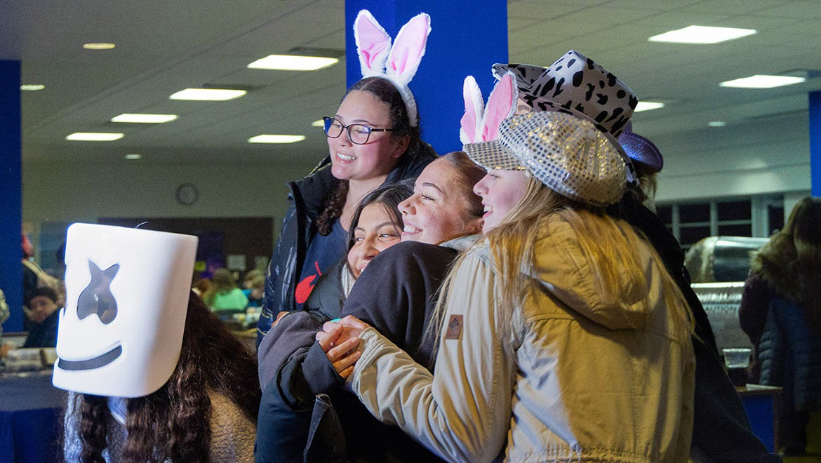 Hartwick College students at Wick Express Event at photo booth