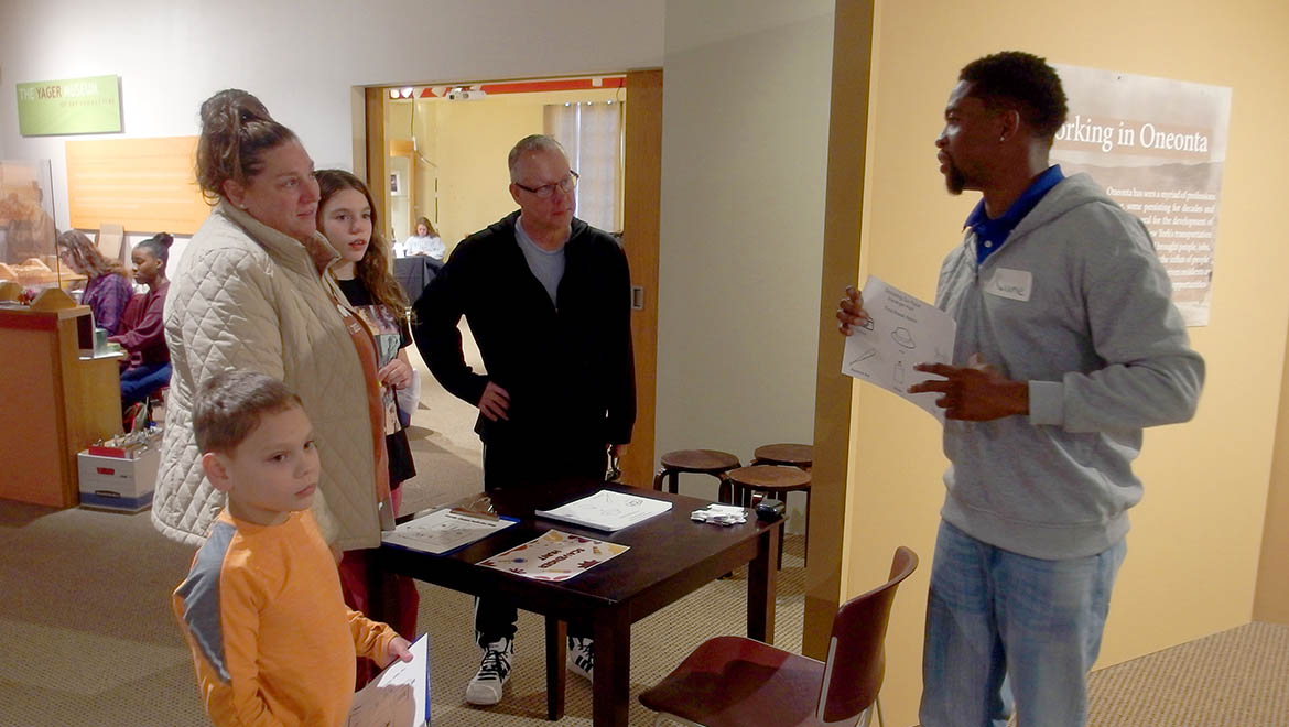 Family checking at Family Quest event in the Hartwick College Yager Museum